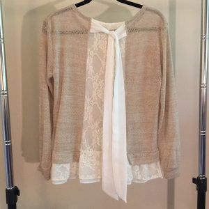 Sweater with tie in back